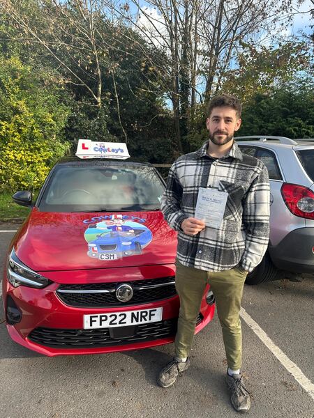 A Cowley's pupil celebrating passing their driving test