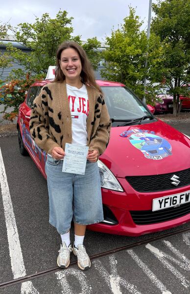 A Cowley's pupil celebrating passing their driving test