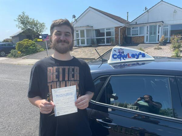 A Cowley's pupil celebrating passing their driving test