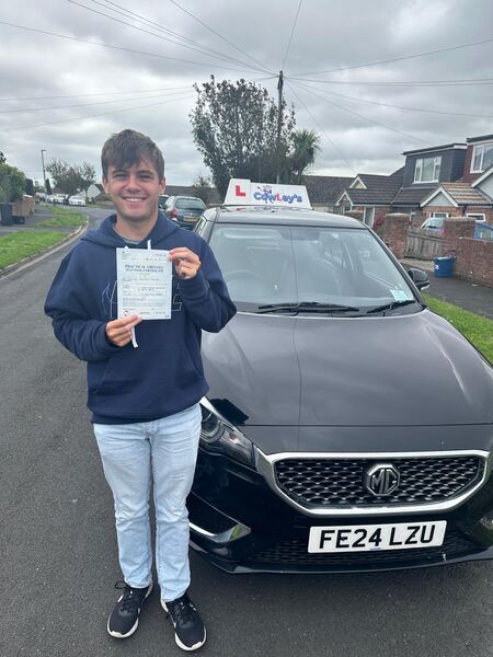 A Cowley's pupil celebrating passing their driving test